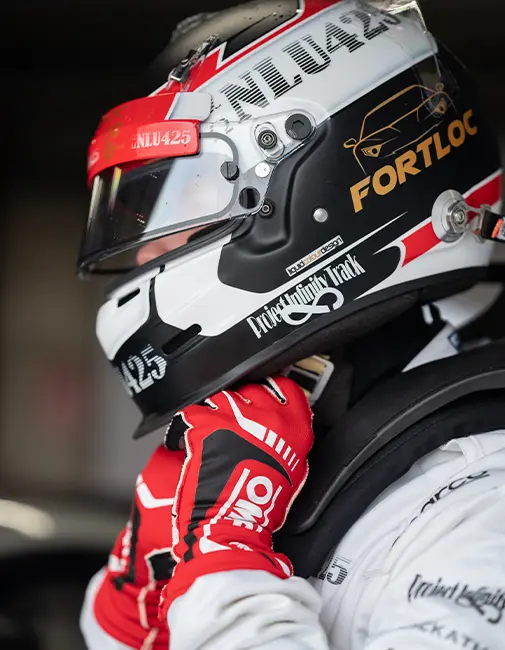 Fortloc racing driver on race day