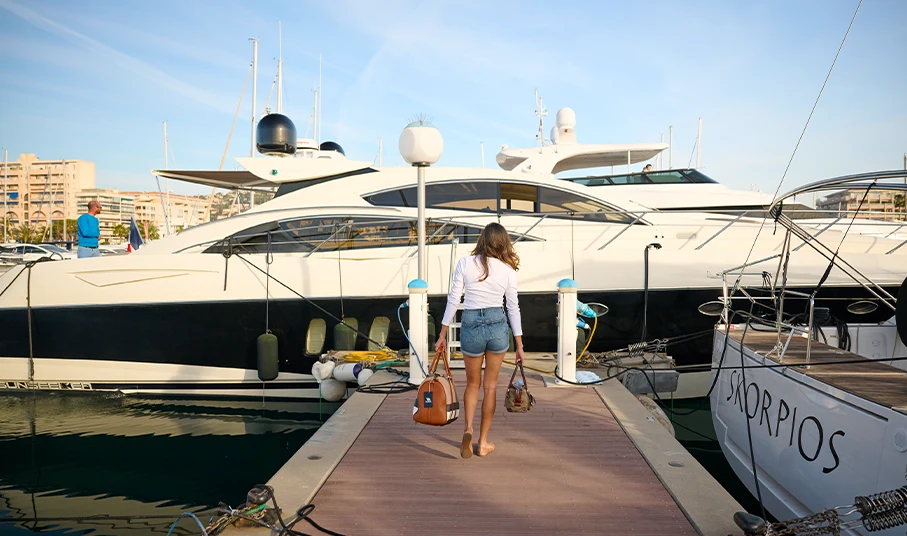 Raquel Romans about to board Sunseeker Predator yacht