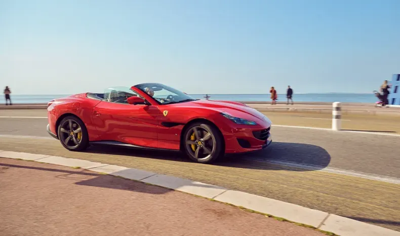 Raquel Romans in a Ferrari Portofino