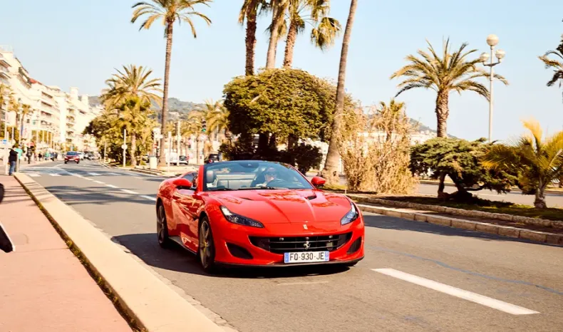 Raquel Romans with a Ferrari Portofino