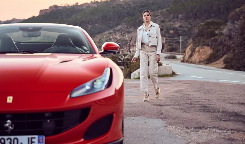 Raquel Romans with a Ferrari Portofino