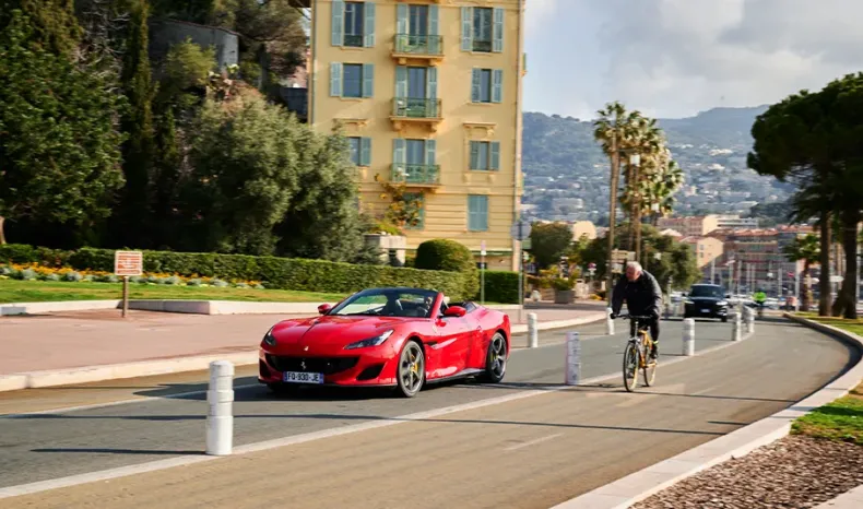 Raquel Romans with a Ferrari Portofino