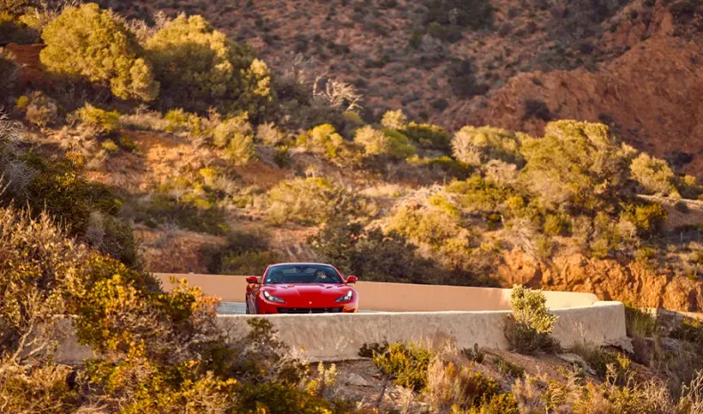 Raquel Romans with a Ferrari Portofino